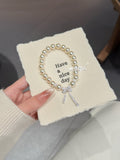"Stellar Ribbon" Pearl Bracelet - S925 Silver Crystal Bow-Knot Charm for Romance, Elegance & Inner Youth